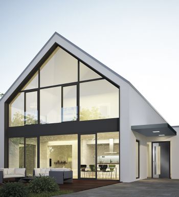 UNILUX aluminium Haustür in modernem Gebäude mit großer Fensterfront