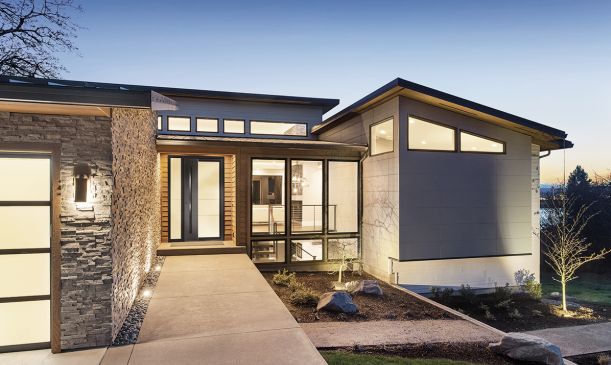 Aluminium Haustür mit Holzelement in modernem Gebäude